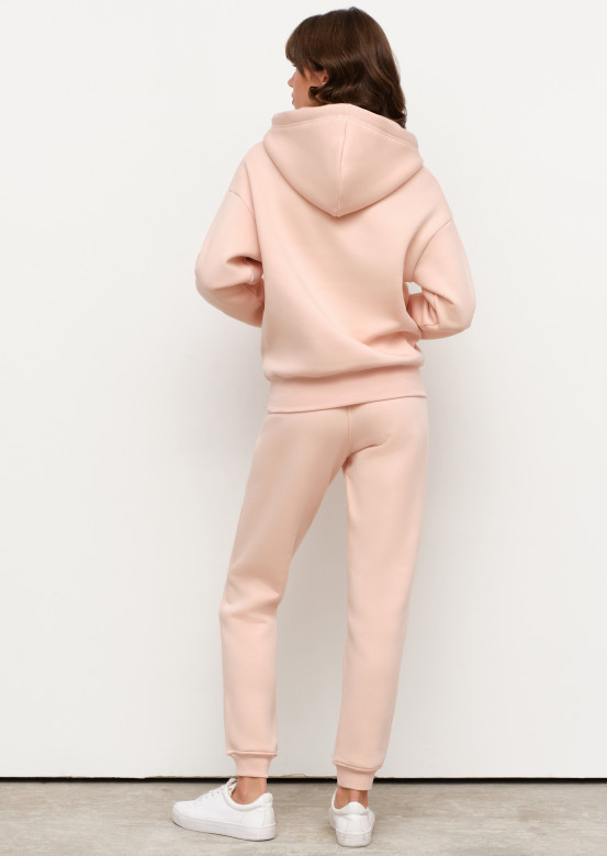 Pink cameo colour footer suit with a hood 