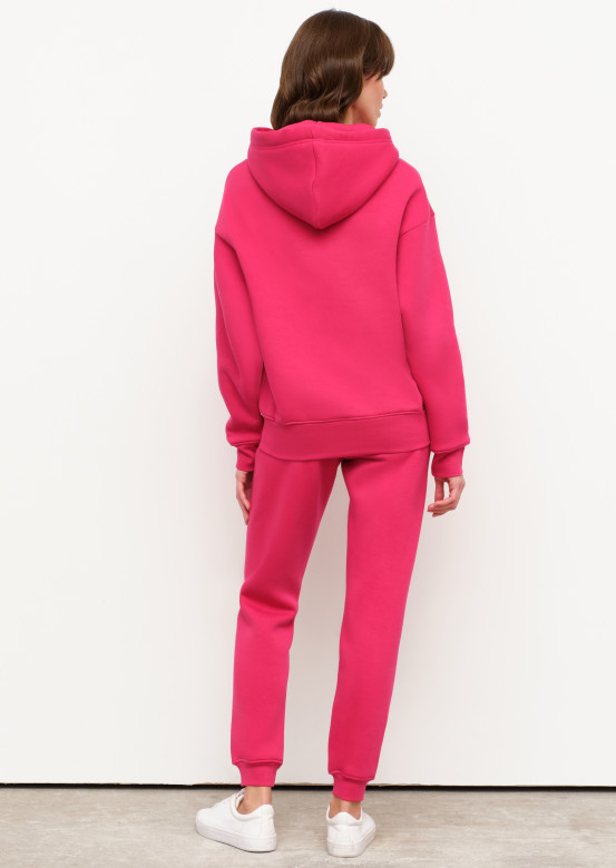 Fuchsia colour footer suit with a hood 
