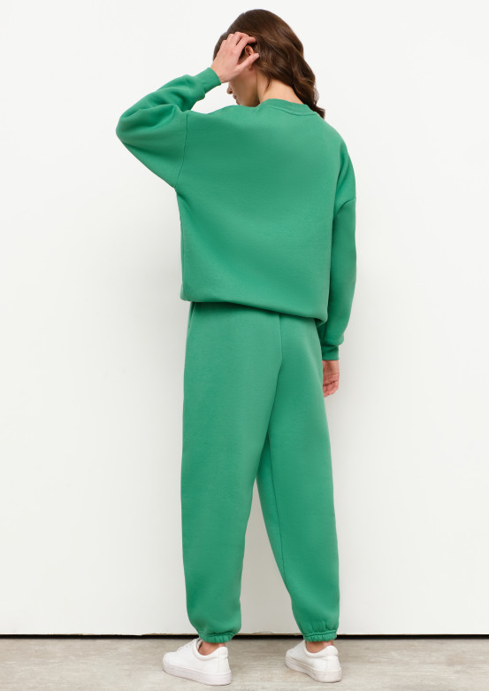 Green footer suit with volumetric pants 