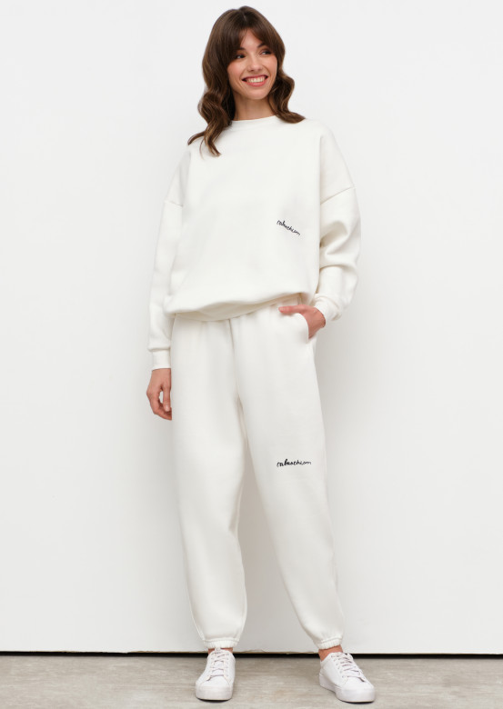 Milky colour footer suit with volumetric pants