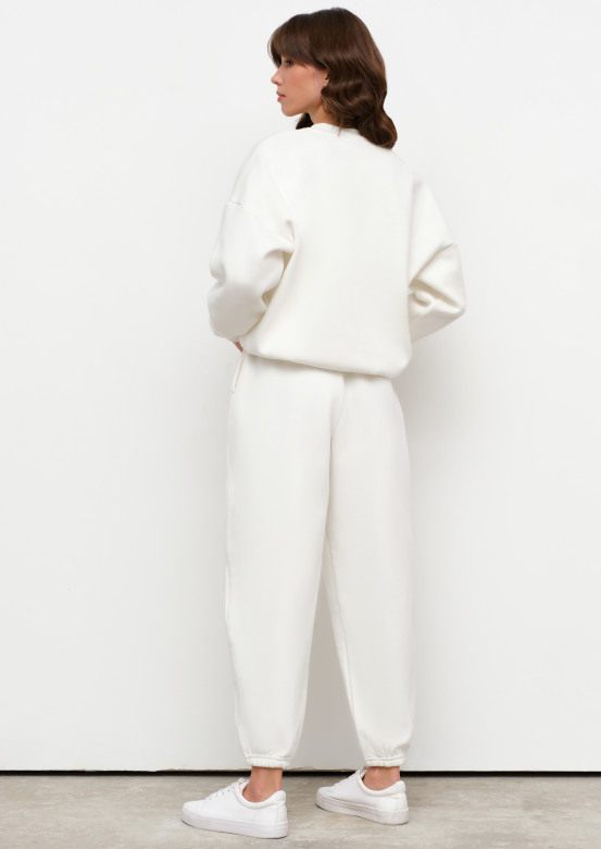 Milky colour footer suit with volumetric pants