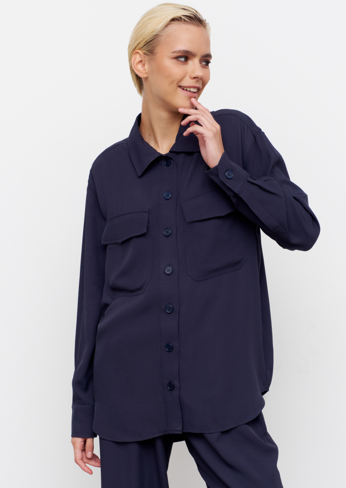 Dark blue colour shirt with pockets