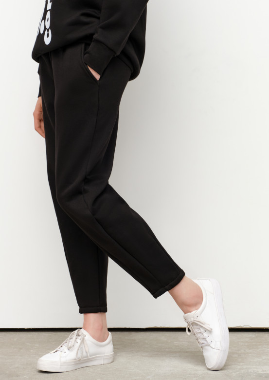 Black pleated front footer trousers