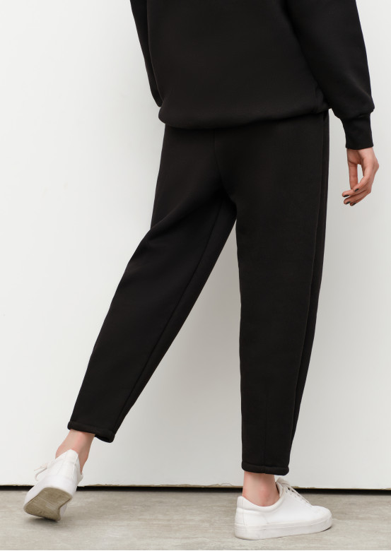 Black pleated front footer trousers