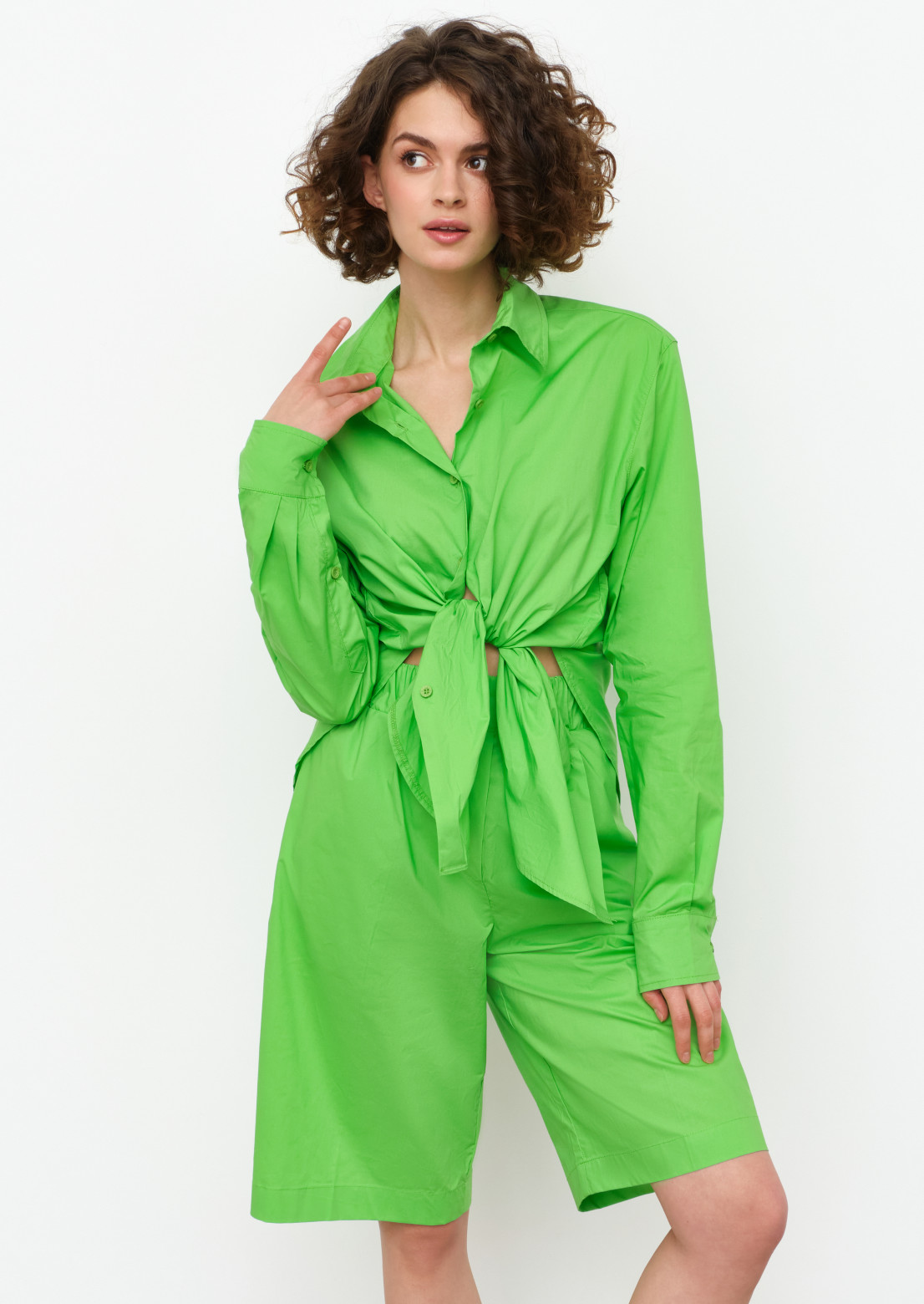 Light green colour suit with shirt and elongated shorts 