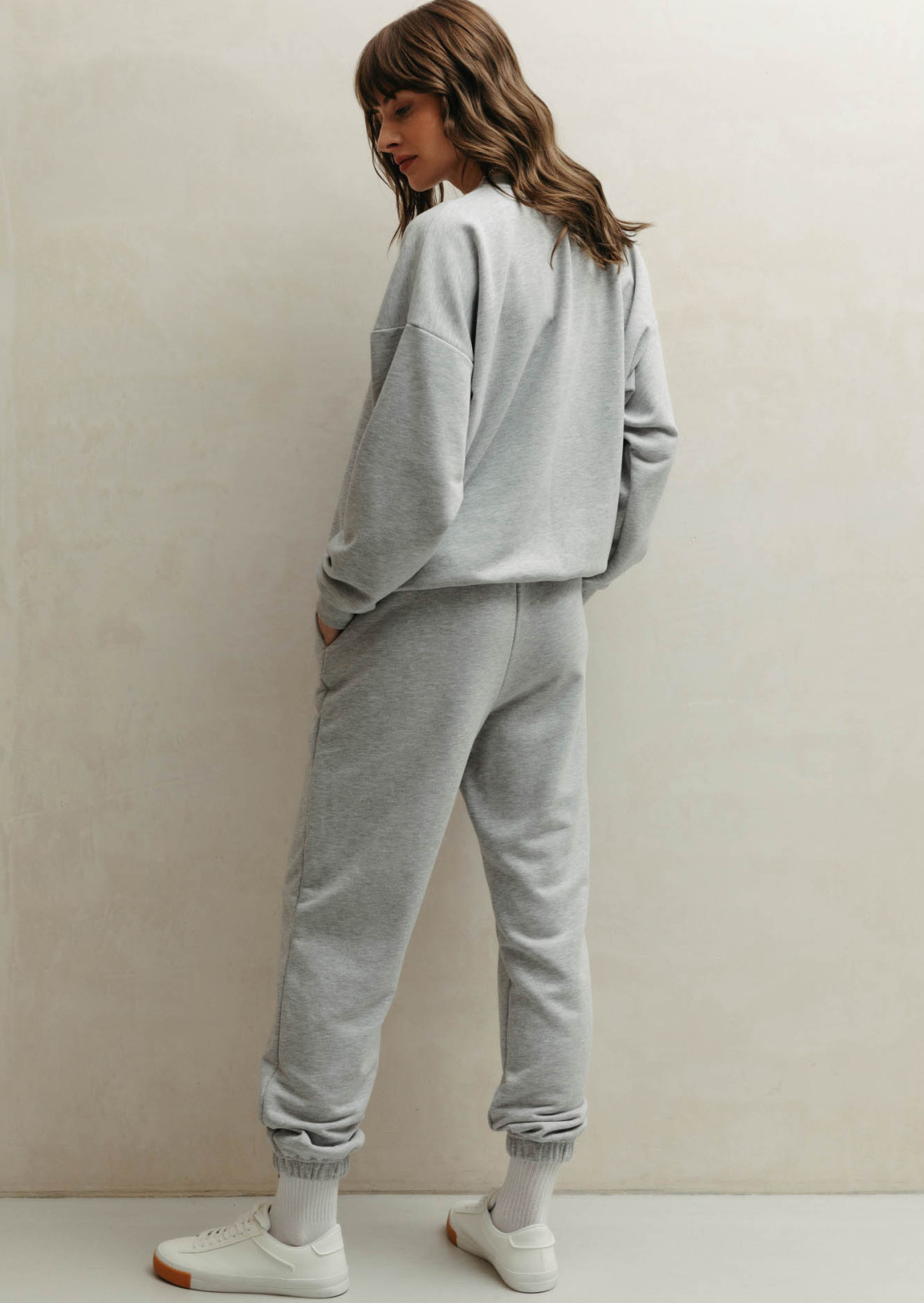 Grey melange color three-thread suit with sweatshirt and joggers