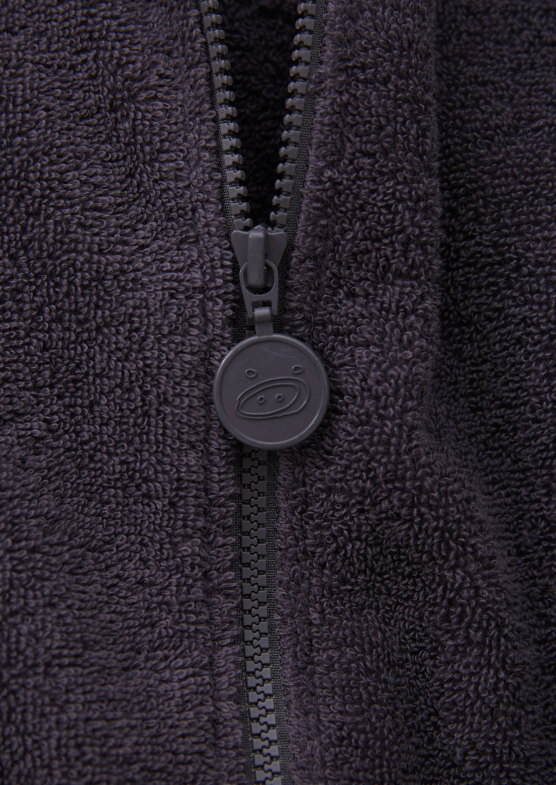 Grey hoodie made of terry fabric with a zipper