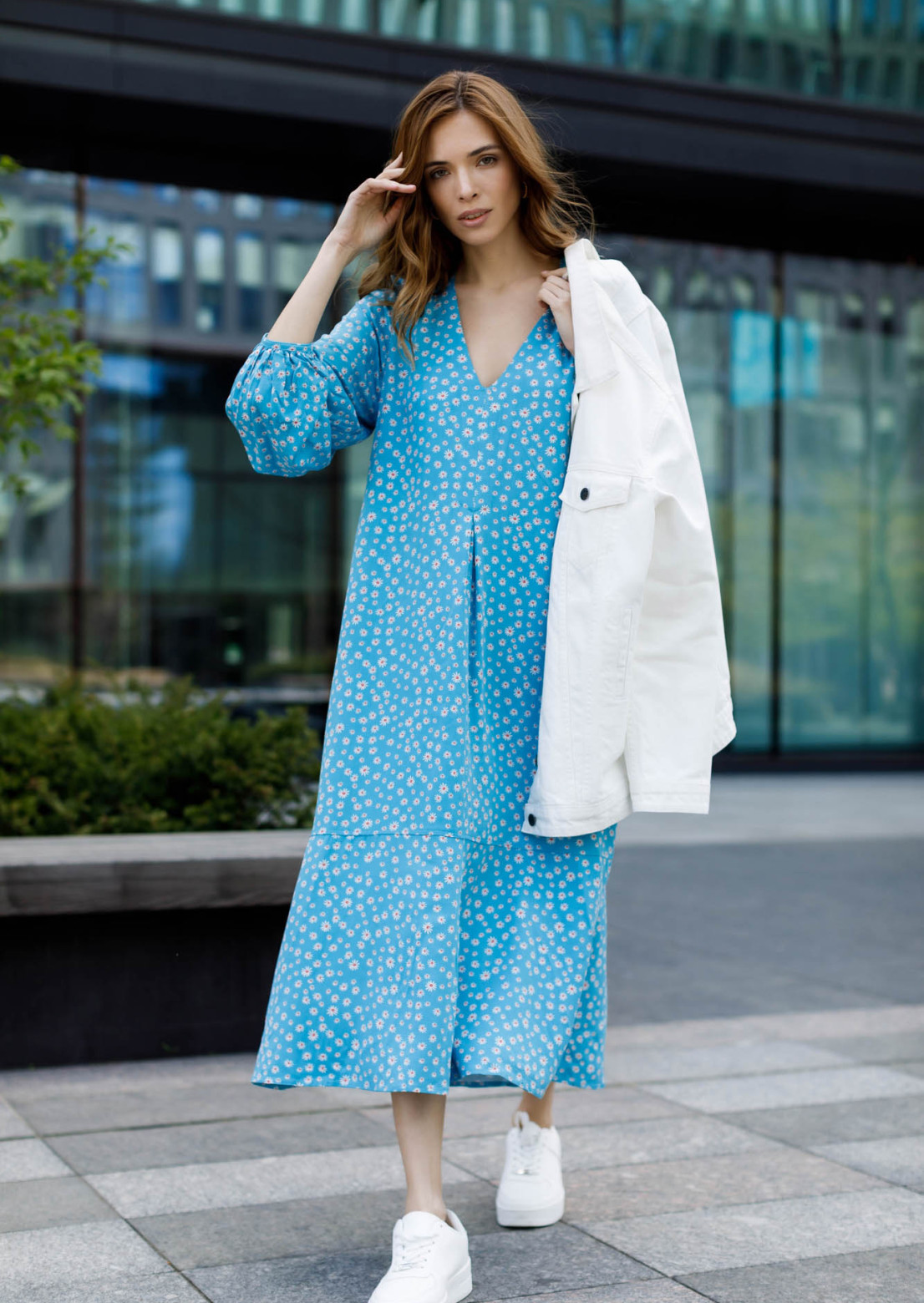 Blue color dress in a flower pattern with voluminous sleeves