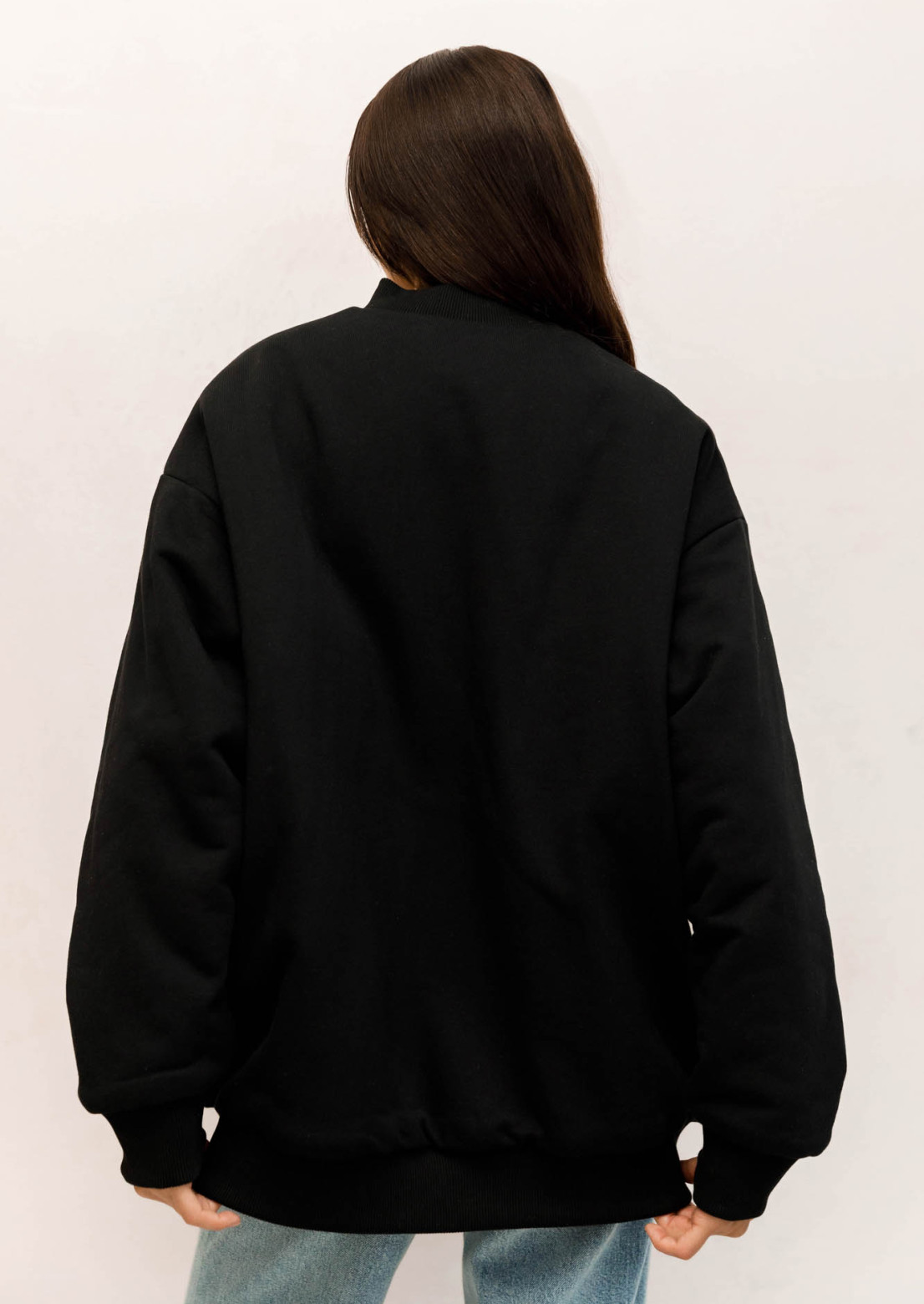 Black bomber jacket made of dense three-thread