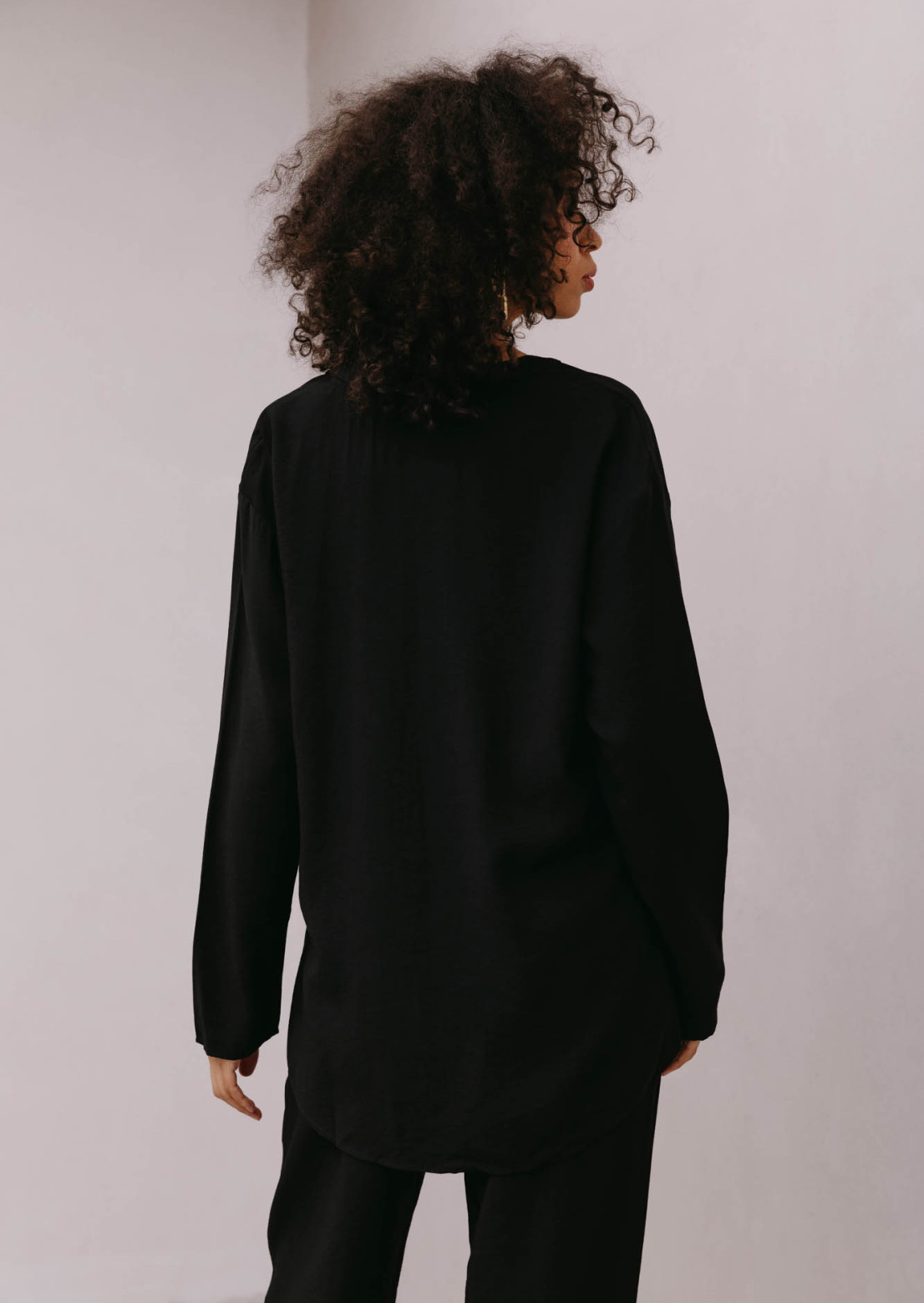 Black colour shirt with a stand-up collar