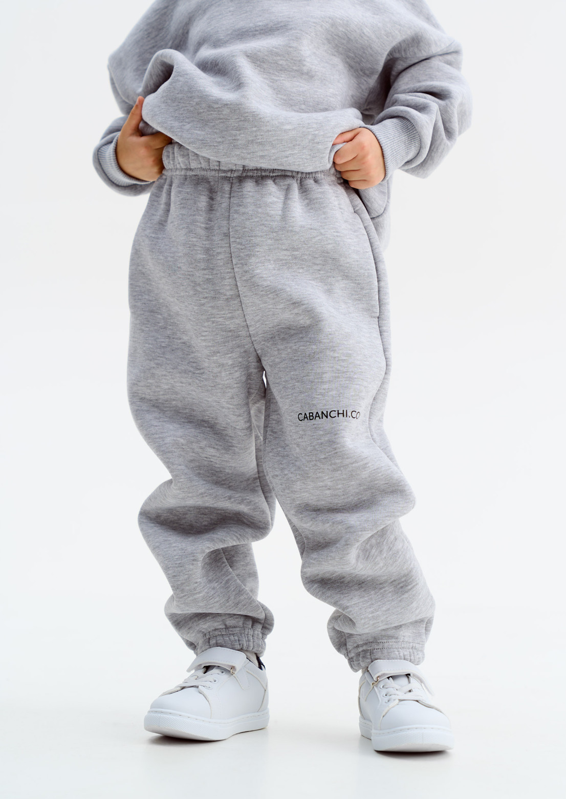 Grey melange color kids three-thread insulated oversize trousers with print "Cabanchi.com"
