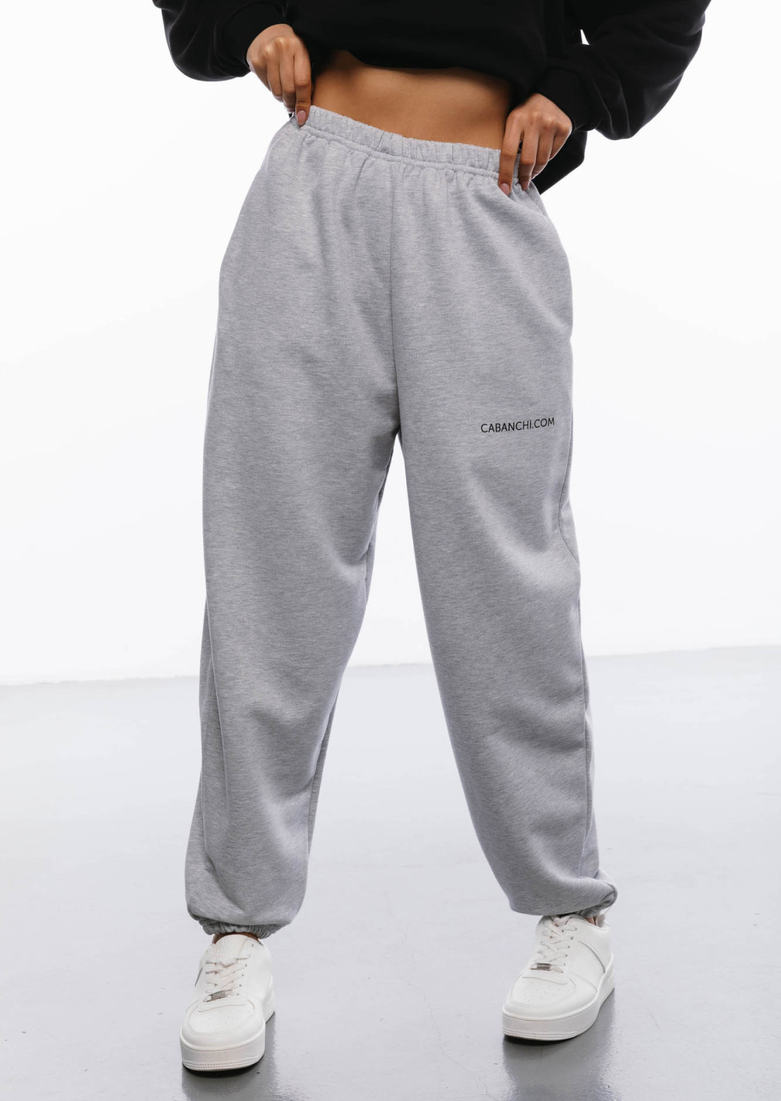 Grey melange color oversize three-thread trousers with print