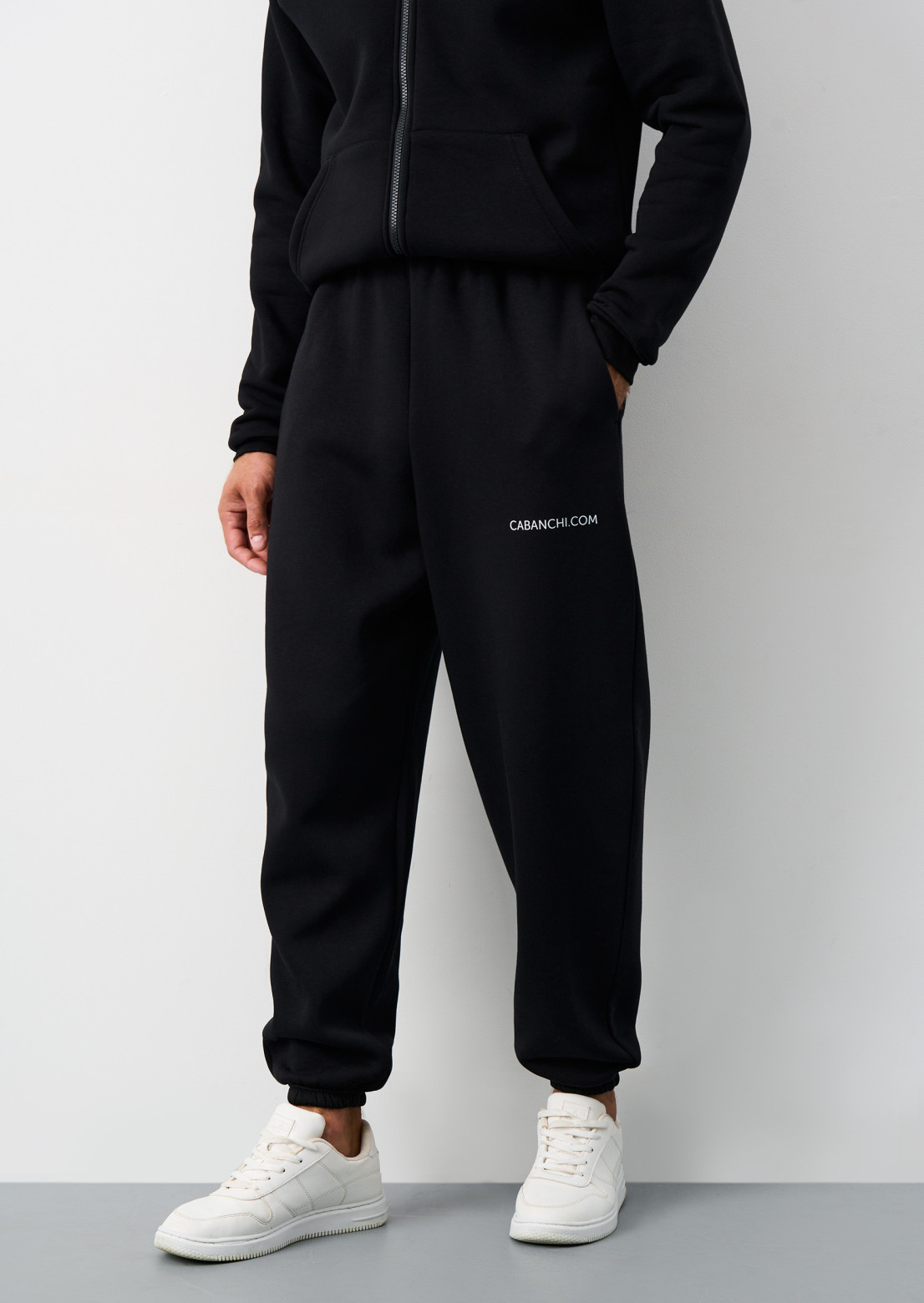 Black color unisex oversize three-thread insulated trousers with print