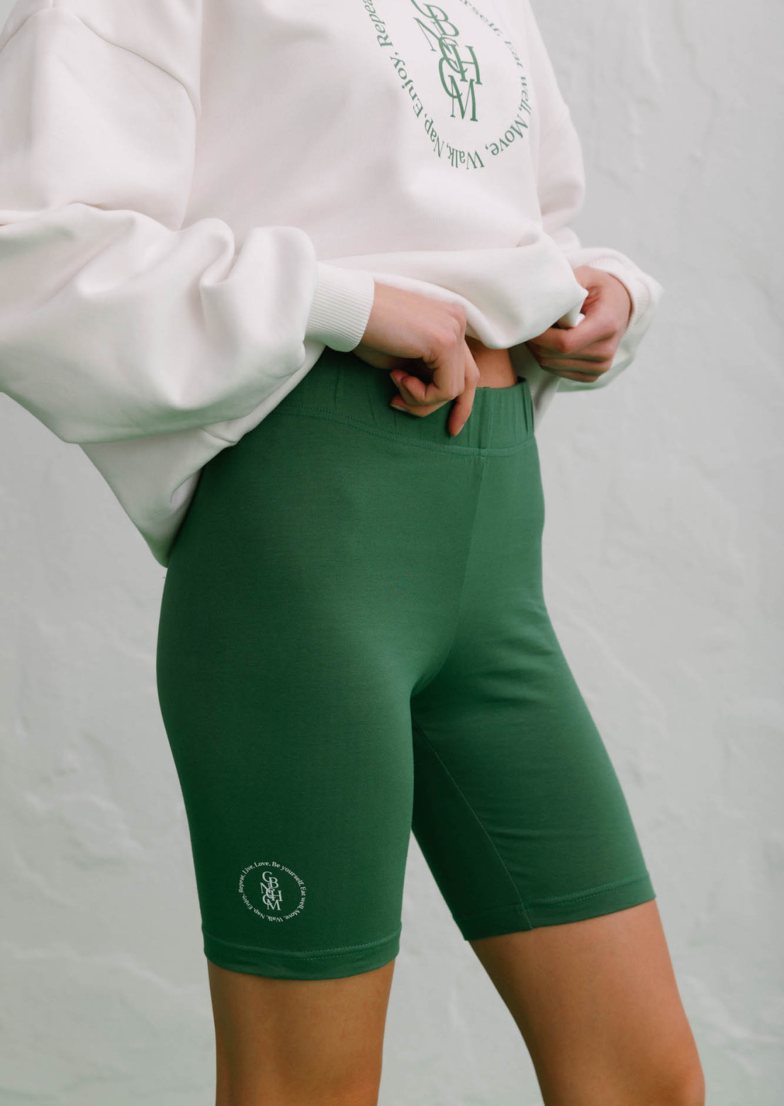 Green color cycling shorts with a circle print "CBNCHCM"