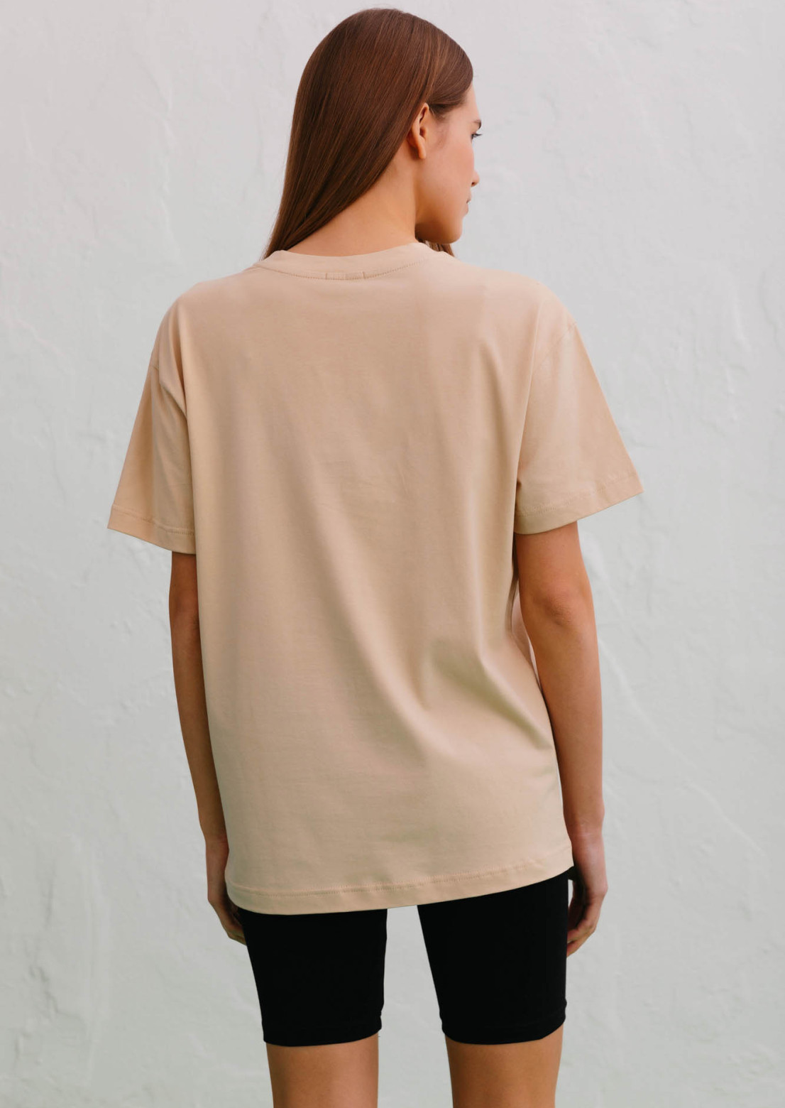 Bodily color T-shirt with a print "CBNCHCM"