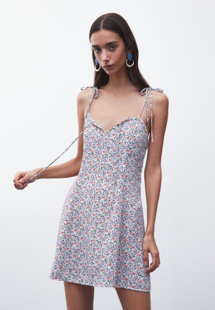 Mini dress with thin straps in a miniature flower 