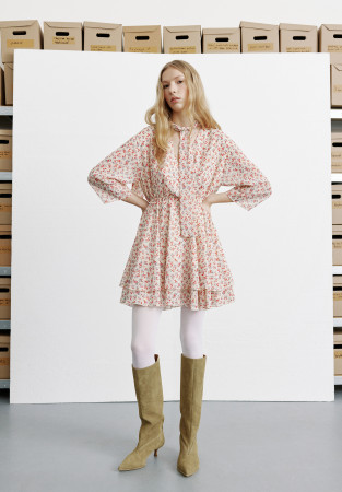 Cream chiffon dress in a flower pattern with a neck detail