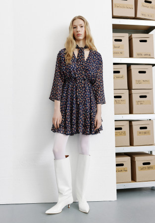 Dark blue chiffon dress in a flower pattern with a neck detail