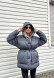 Black color down jacket puffer with a hood and drawstring