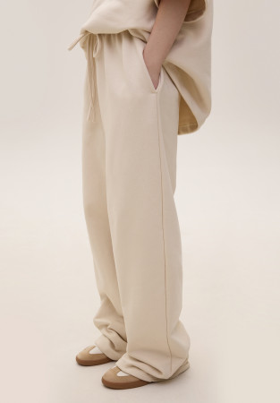 Natural oversize trousers made of dense three-thread Natural oversize trousers made of dense three-thread