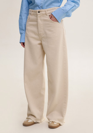 Джинси baggy з необробленим краєм молочні