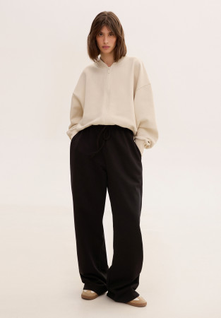 Black oversize trousers made of dense three-thread Black oversize trousers made of dense three-thread