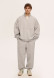Almost black color men three-thread insulated trousers with a drawstring
