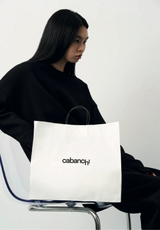 Medium size white paper package with handles 38х14х33,5 cm