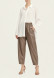 Brown eco-leather pants